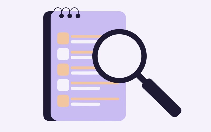 Keyword research workspace with notes, laptop, and SEO planning tools